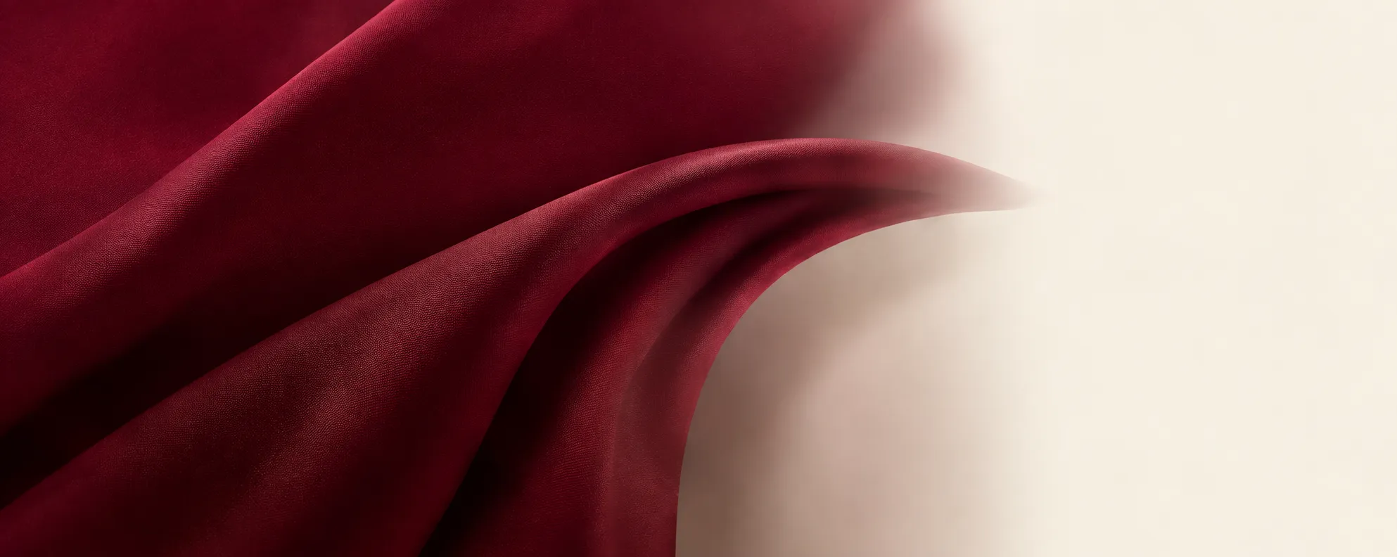 Draped maroon fabric